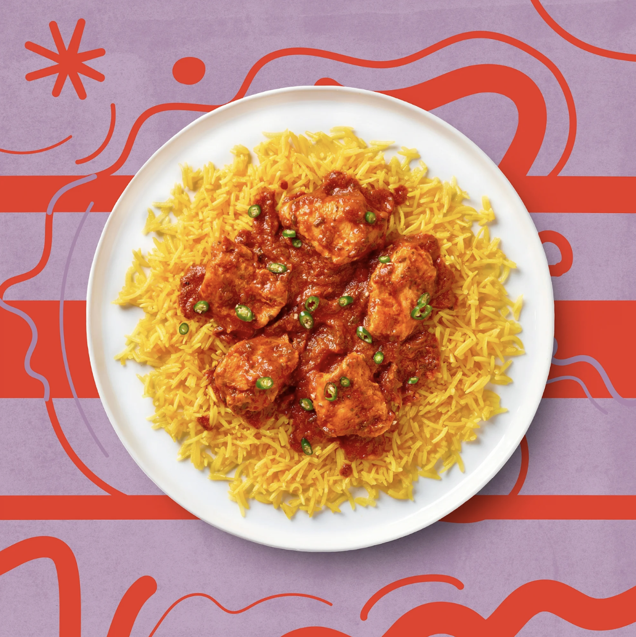 Chef Bombay Firey Chicken Curry in a bowl against a purple and red patterned background.